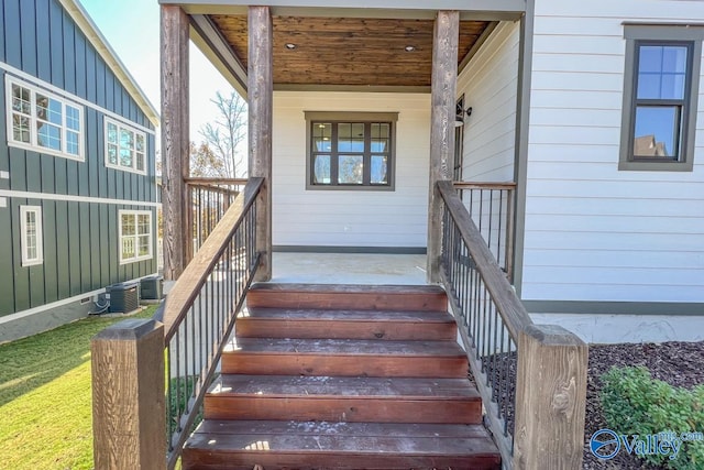 doorway to property with central air condition unit