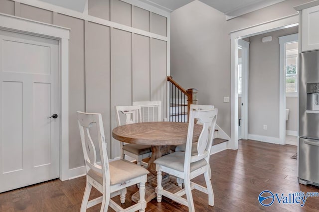 dining room with dark wood-type flooring