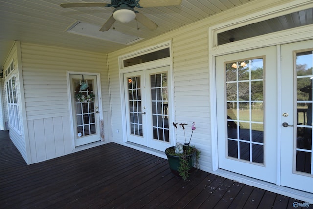 deck with french doors and ceiling fan