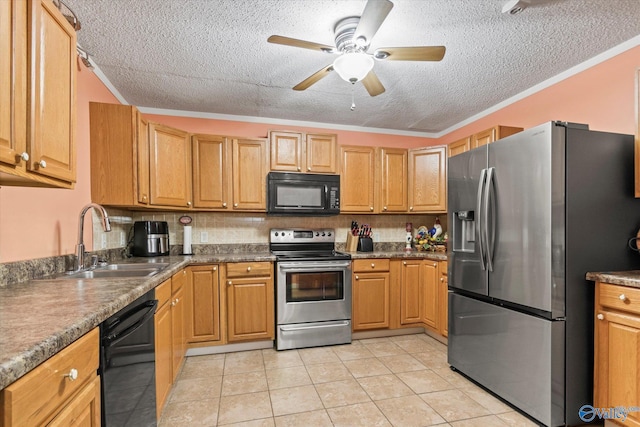 kitchen with light tile patterned floors, a textured ceiling, a sink, ornamental molding, and black appliances