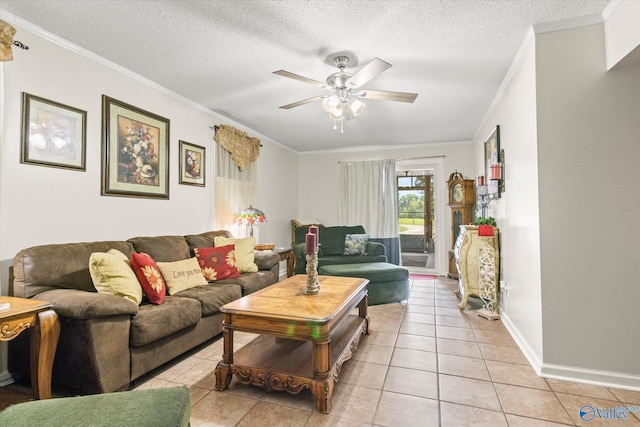living room featuring ornamental molding, light tile patterned flooring, a textured ceiling, and a ceiling fan