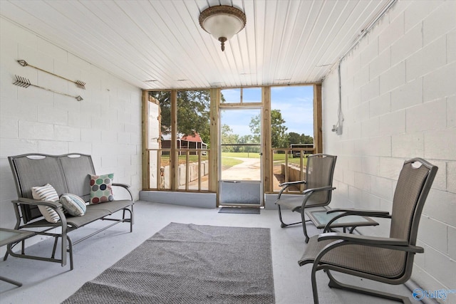 sunroom with wood ceiling