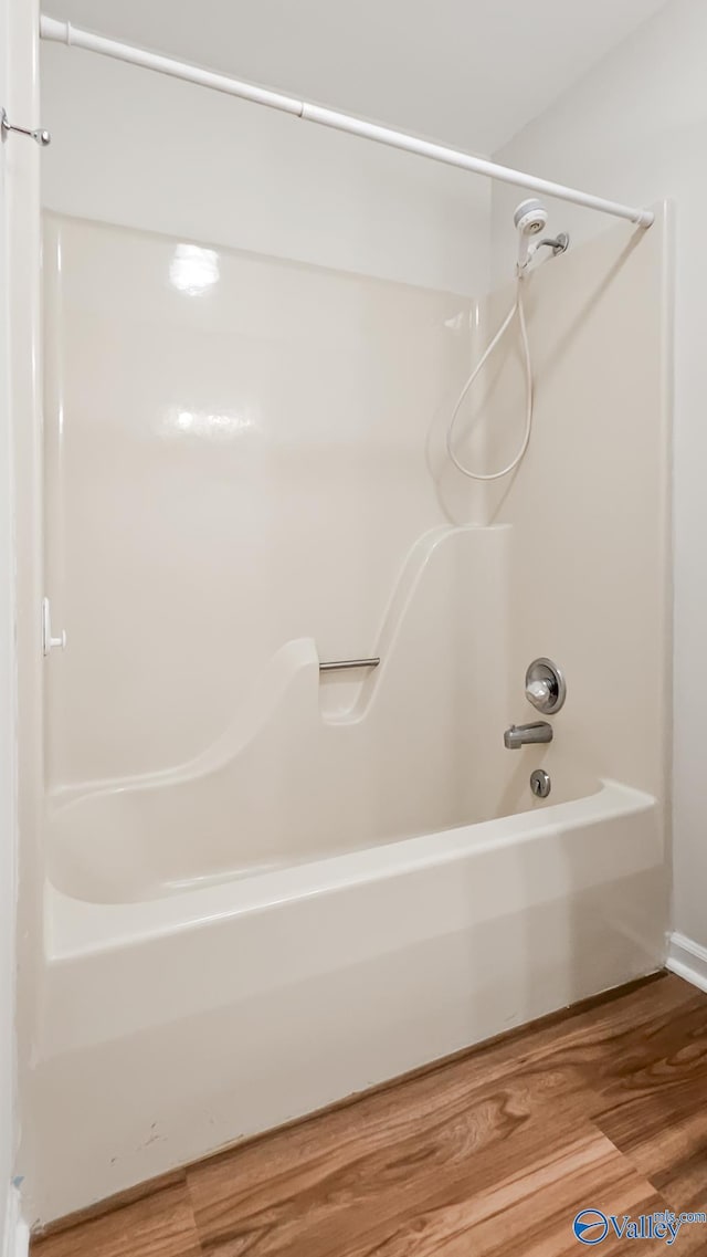 306 Autumn Ln, Madison, AL 35758 - full bathroom featuring  shower combination and wood finished floors