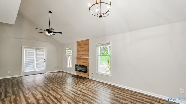 306 Autumn Ln, Madison, AL 35758 - unfurnished living room with dark wood-style flooring, ceiling fan, a chandelier, a fireplace, and high vaulted ceiling