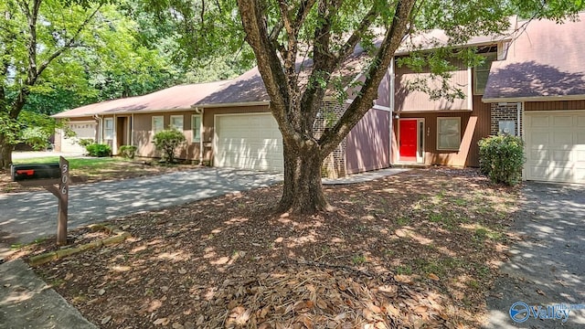 306 Autumn Ln, Madison, AL 35758 - view of front facade with an attached garage and driveway