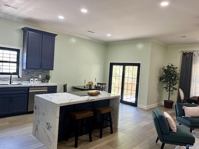 347 Rustic Trce, Grant, AL 35747 - kitchen with stainless steel dishwasher, a sink, light wood finished floors, backsplash, and recessed lighting