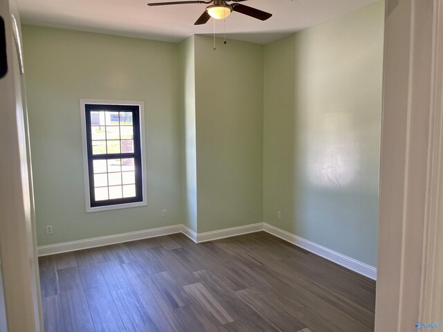 347 Rustic Trce, Grant, AL 35747 - unfurnished room with a ceiling fan, dark wood-style floors, and baseboards
