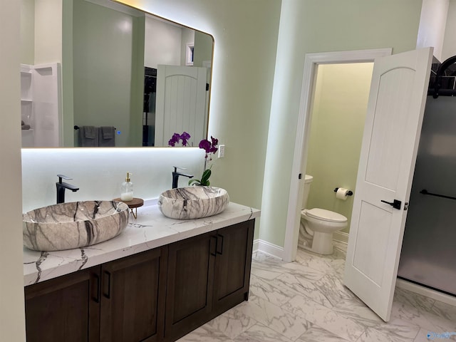 347 Rustic Trce, Grant, AL 35747 - full bath with marble look tiles, toilet, vanity, and baseboards