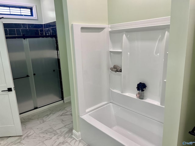 347 Rustic Trce, Grant, AL 35747 - bathroom featuring marble look tiles and tub / shower combination
