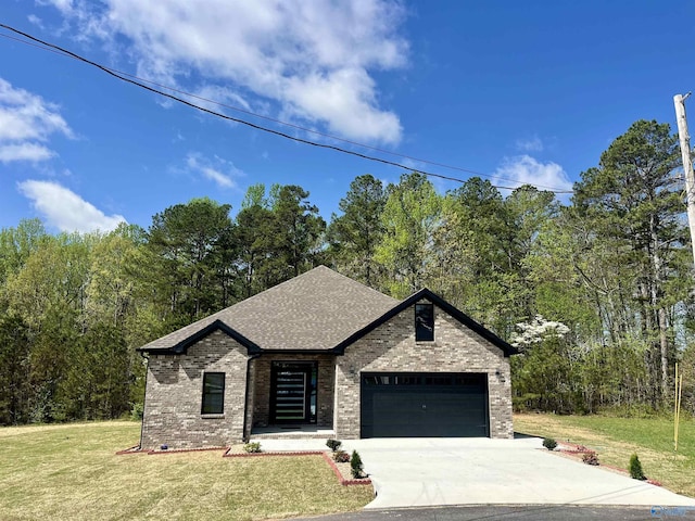 347 Rustic Trce, Grant, AL 35747 - view of front of home featuring brick siding, an attached garage, a front lawn, driveway, and roof with shingles