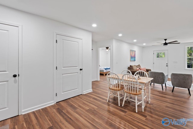 dining room featuring dark hardwood / wood-style floors and ceiling fan