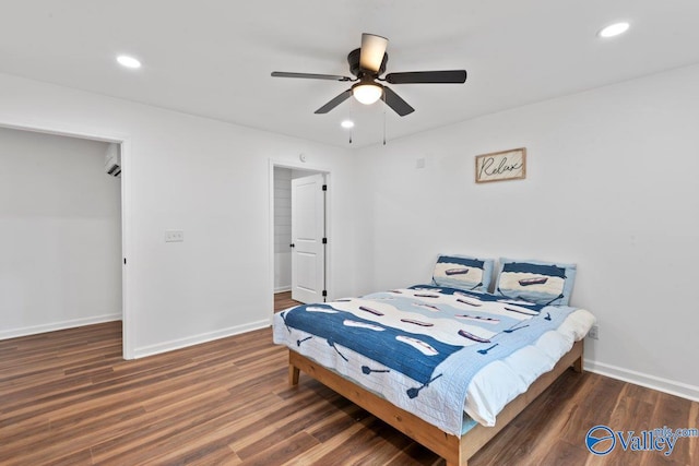 bedroom with dark wood-type flooring and ceiling fan