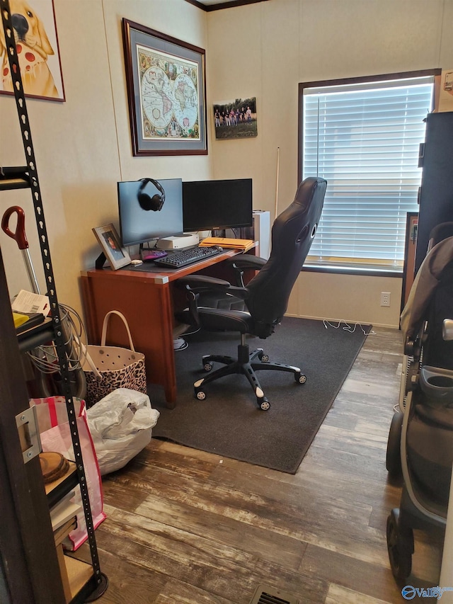 office space with wood finished floors