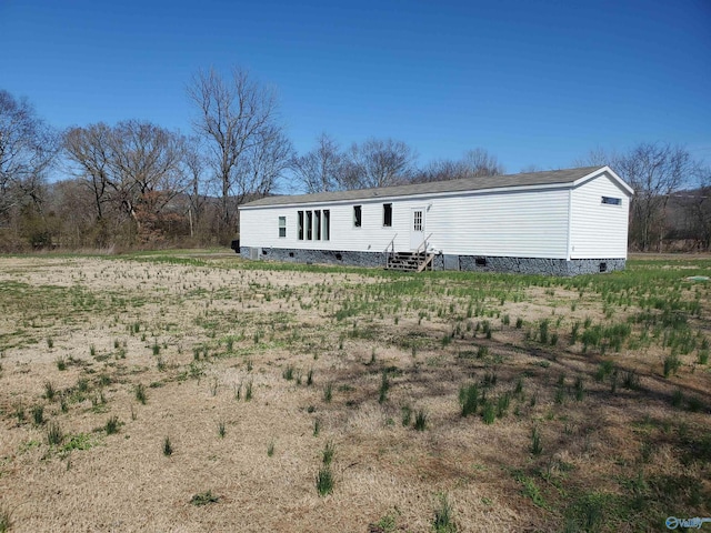 view of front facade featuring entry steps and crawl space