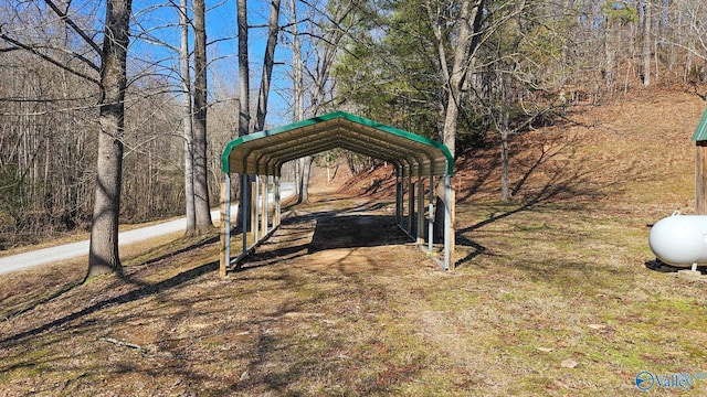 view of yard with a carport