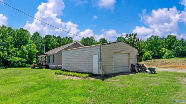 garage with a yard