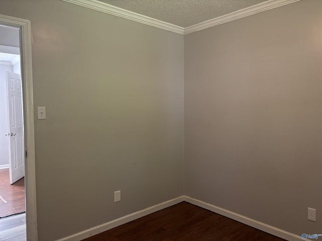162 Forest Chapel Rd, Hartselle, AL 35640 - unfurnished room featuring ornamental molding, dark wood-style flooring, and a textured ceiling