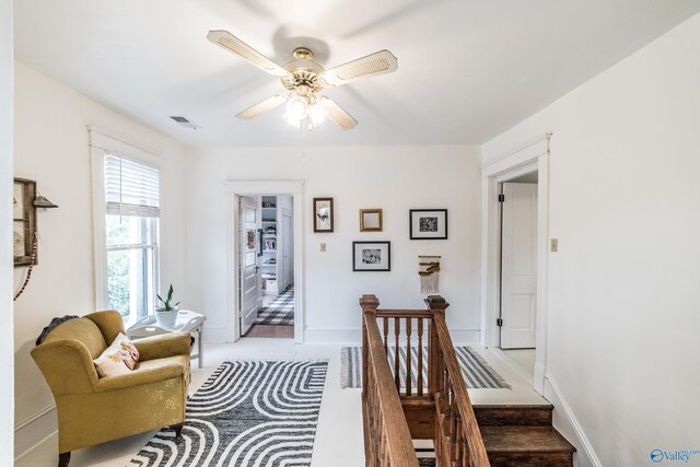 kitchen featuring crown molding, stainless steel appliances, light tile patterned floors, sink, and extractor fan