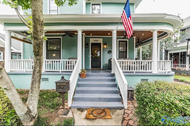 entrance to property featuring crawl space, covered porch, and a ceiling fan