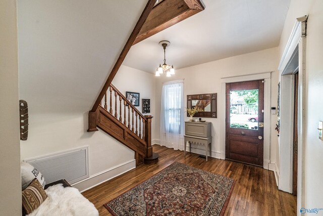 entrance to property with a porch and ceiling fan