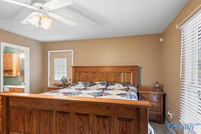 carpeted bedroom with ceiling fan