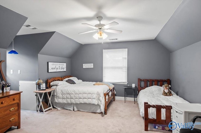 carpeted bedroom with lofted ceiling and ceiling fan