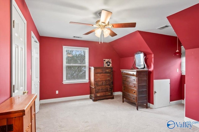 carpeted bedroom with lofted ceiling and ceiling fan