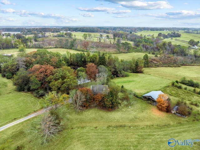 birds eye view of property featuring a rural view