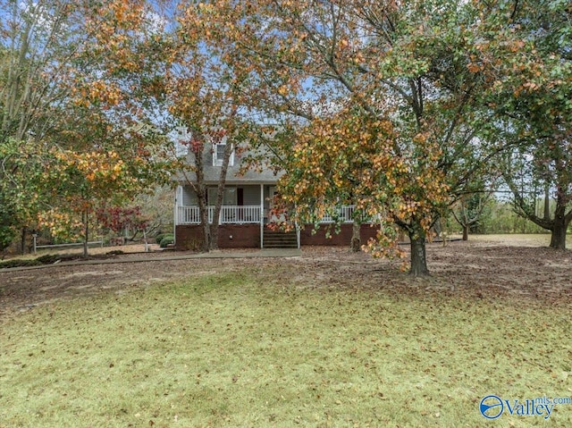 view of yard with a porch