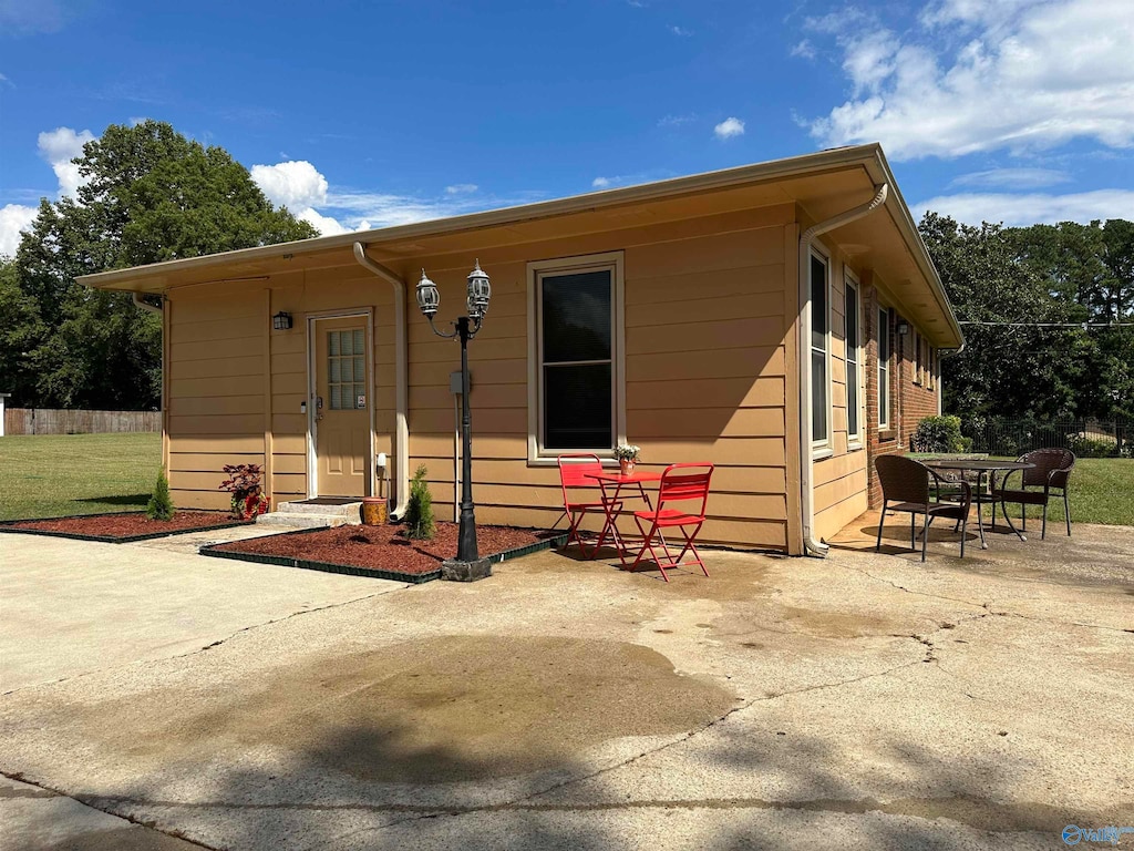 back of house featuring a patio area