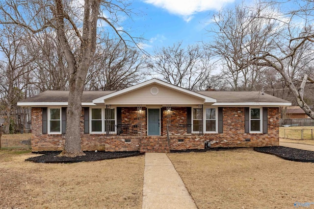 single story home featuring a front yard