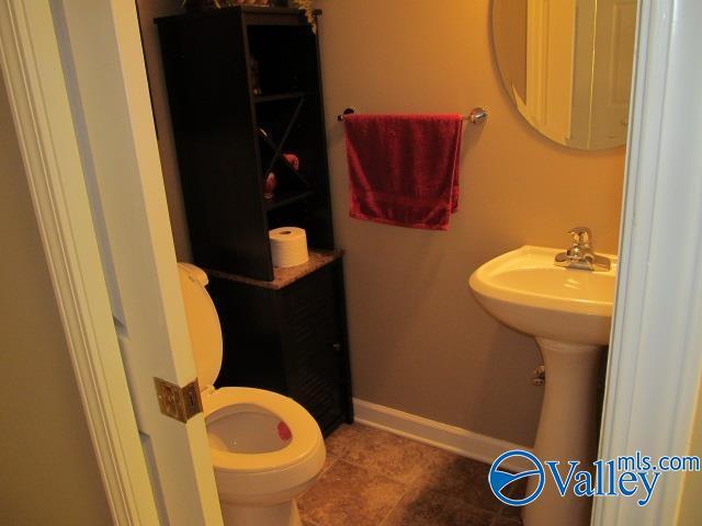 bathroom featuring toilet