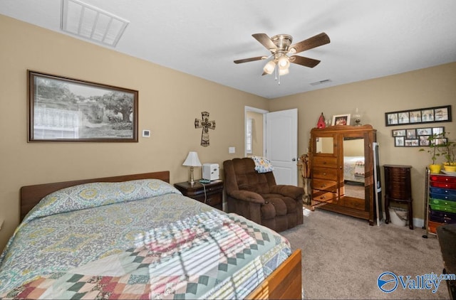 bedroom featuring ceiling fan and light colored carpet