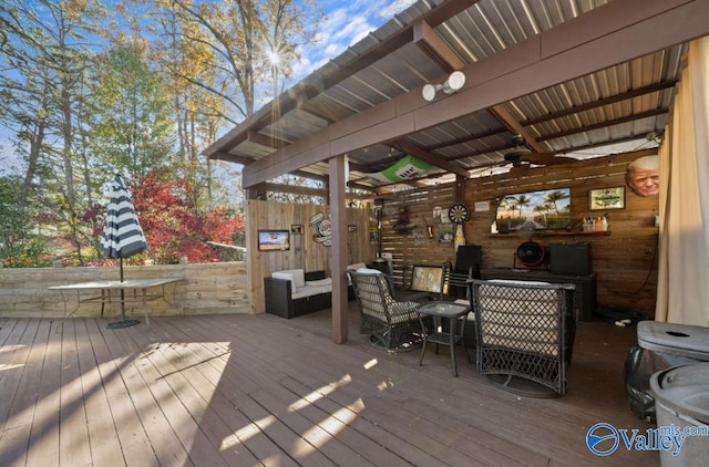 wooden deck with ceiling fan