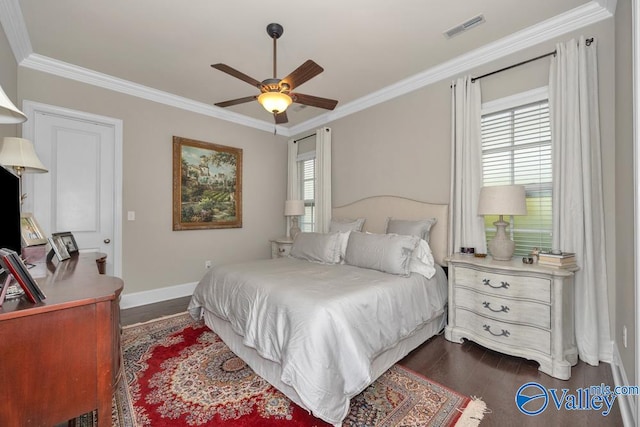 bedroom featuring multiple windows, dark hardwood / wood-style floors, ceiling fan, and crown molding