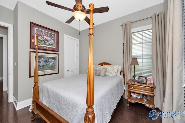 bedroom featuring ceiling fan and dark wood-type flooring