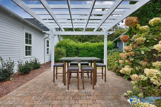 view of patio featuring a pergola