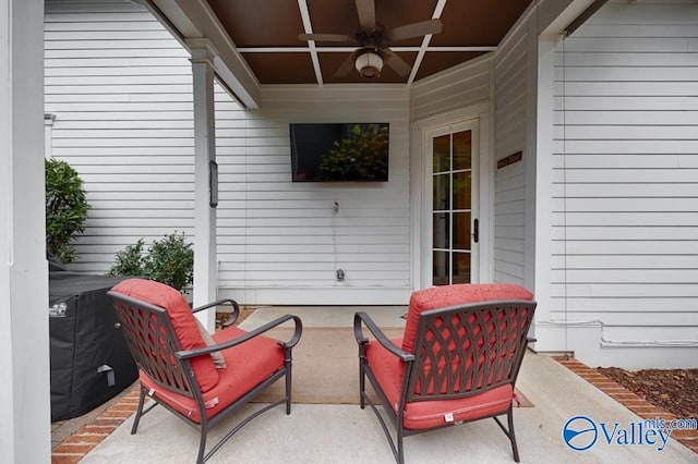 view of patio / terrace featuring ceiling fan