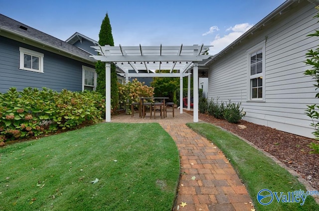 view of yard featuring a pergola and a patio