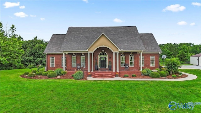 1081 County Road 190, Moulton, AL 35650 - view of front facade with a porch and a front yard