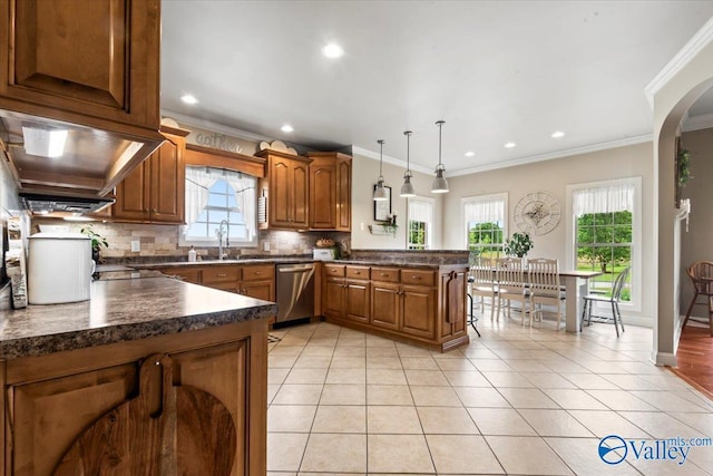 1081 County Road 190, Moulton, AL 35650 - kitchen with dishwasher, a peninsula, dark countertops, tasteful backsplash, and light tile patterned floors