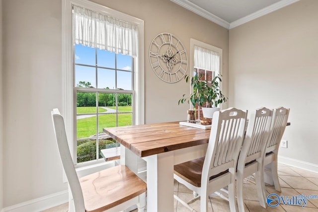 1081 County Road 190, Moulton, AL 35650 - dining area with healthy amount of natural light, ornamental molding, baseboards, and light tile patterned floors