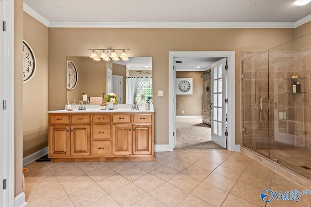 1081 County Road 190, Moulton, AL 35650 - full bathroom with double vanity, ornamental molding, a stall shower, tile patterned floors, and baseboards