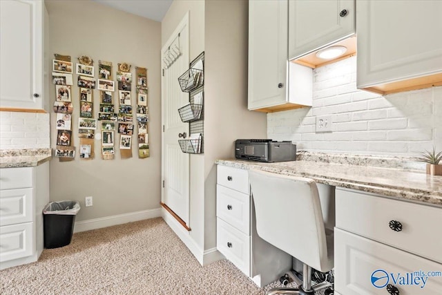 1081 County Road 190, Moulton, AL 35650 - office area featuring light carpet, baseboards, and built in study area