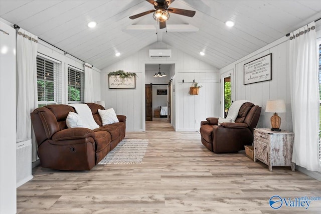 1081 County Road 190, Moulton, AL 35650 - living room featuring a barn door, ceiling fan, wood finished floors, an AC wall unit, and recessed lighting