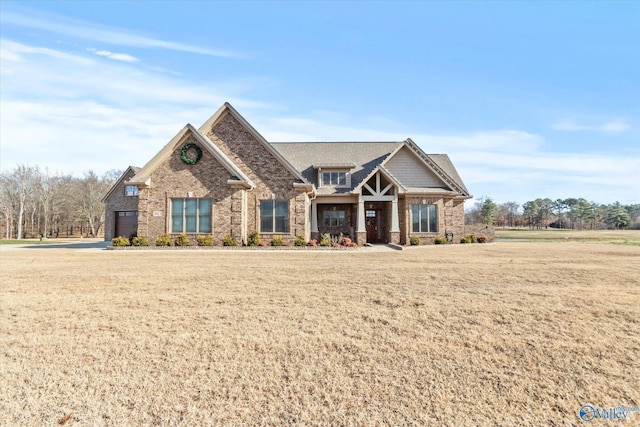 craftsman-style home with a garage