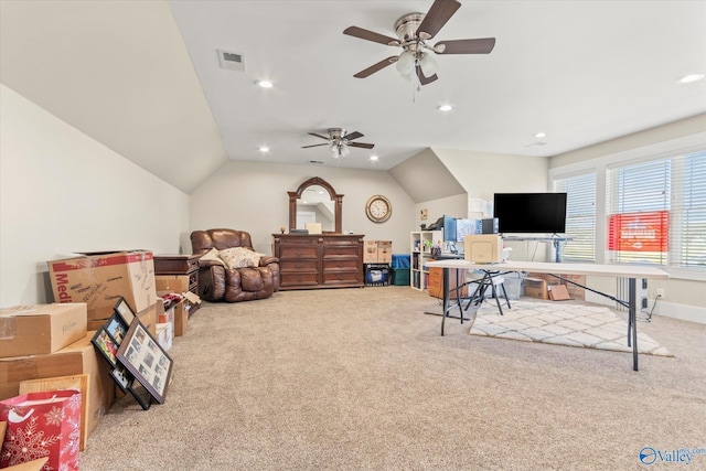 home office with light carpet, vaulted ceiling, and ceiling fan