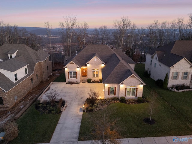 view of front of home with a yard