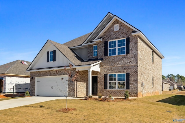 view of front facade featuring brick siding, roof with shingles, a front yard, a garage, and driveway