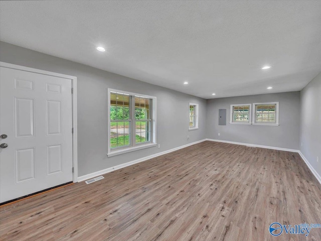 1492 County Road 314, Town Creek, AL 35672 - spare room featuring wood finished floors, electric panel, recessed lighting, and baseboards